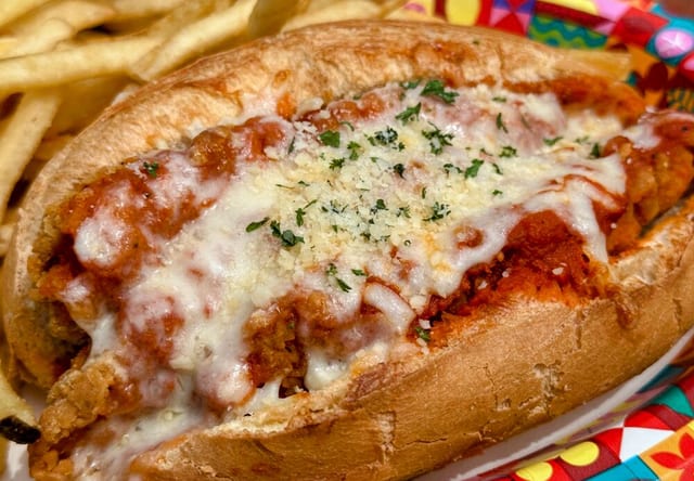 Breaded Chicken Parmesan with Fries.